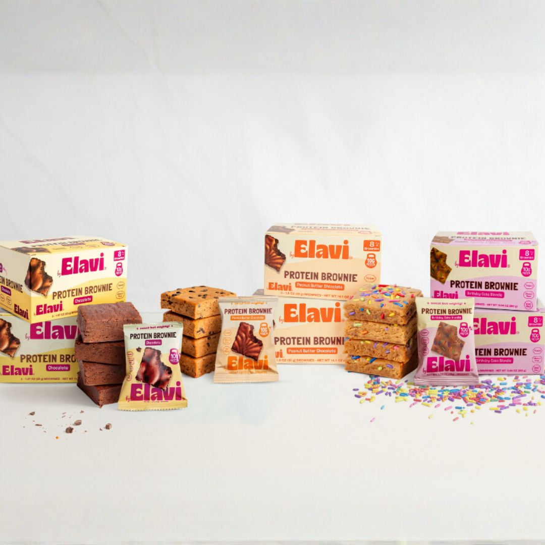 Front view of Protein Brownie bundle showing chocolate, peanut butter, and birthday cake brownies with boxes on white background